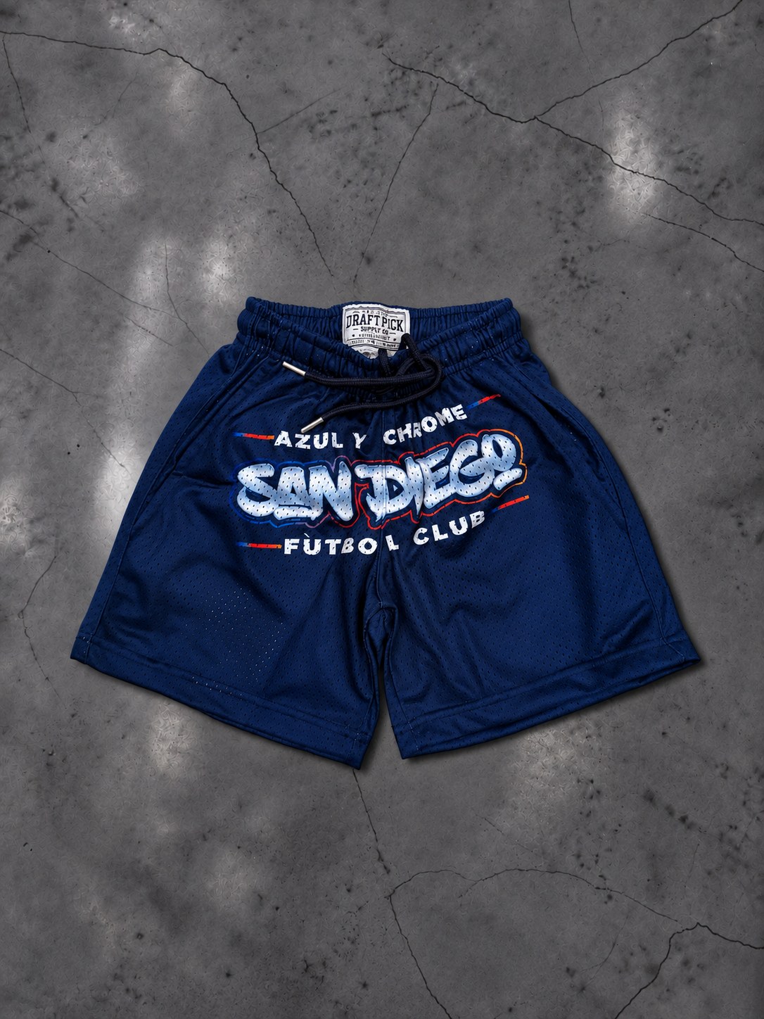 Azul y Chrome Kids — mesh shorts